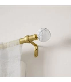 Umbra Tringle à Rideaux En Métal Doré Extensible De 91 à 183cm -Produits Menagers Boutique tringle a rideaux en metal dore extensible de 91 a 183cm 3